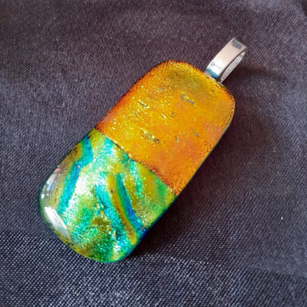 Fused glass pendant in orange and green dichroic glass, handmade