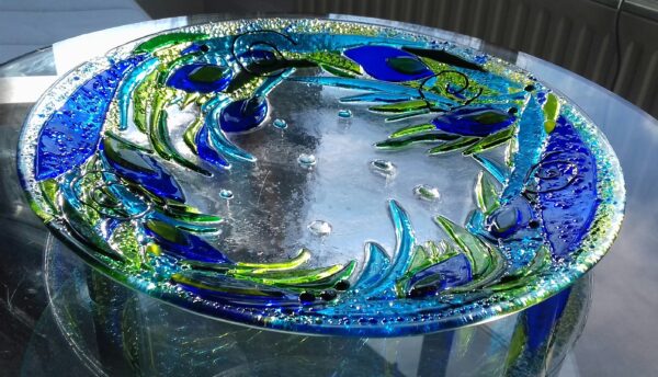 Fused glass dish in blues and greens (peacock tail style)